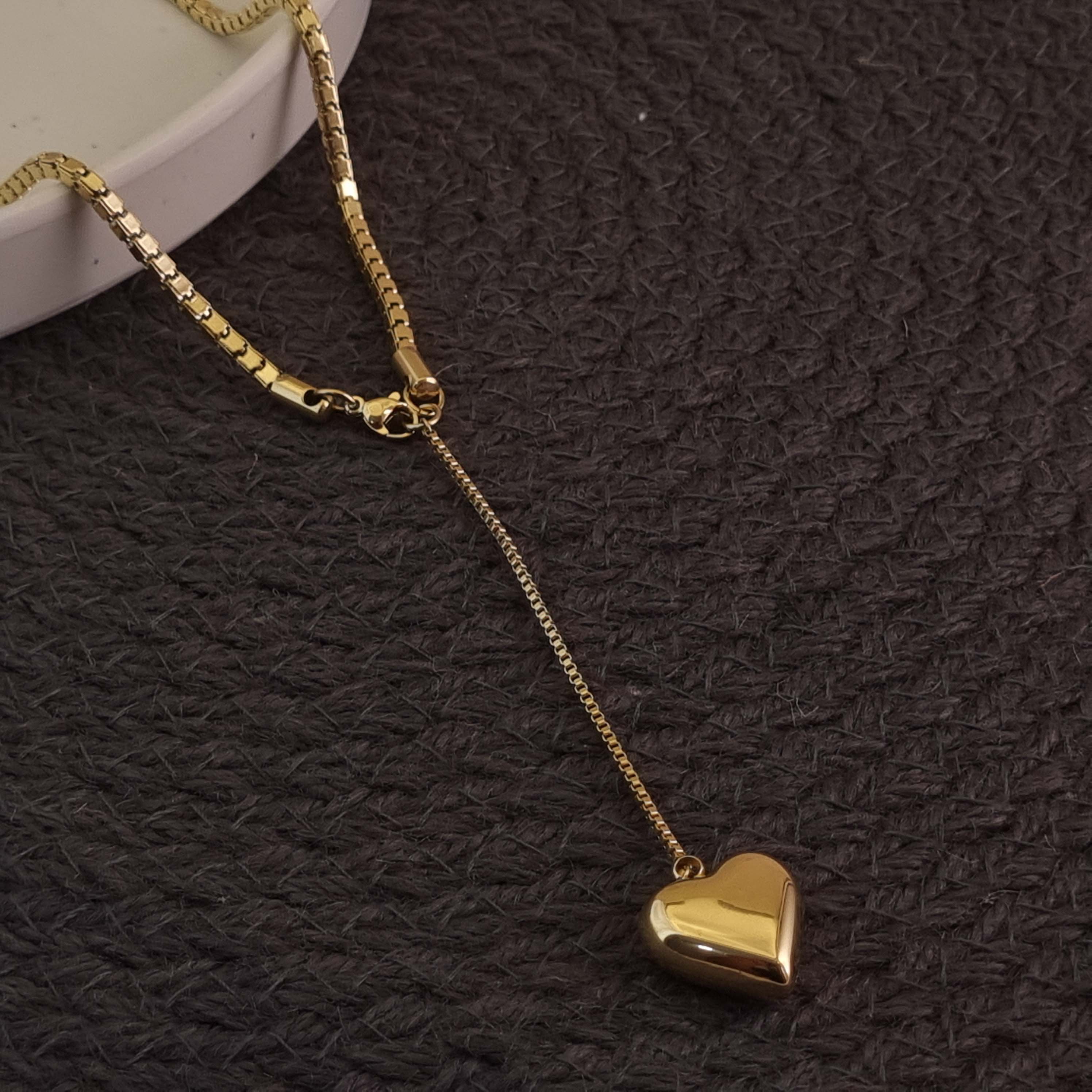 Timeless Love: The Gold Heart Drop Necklace