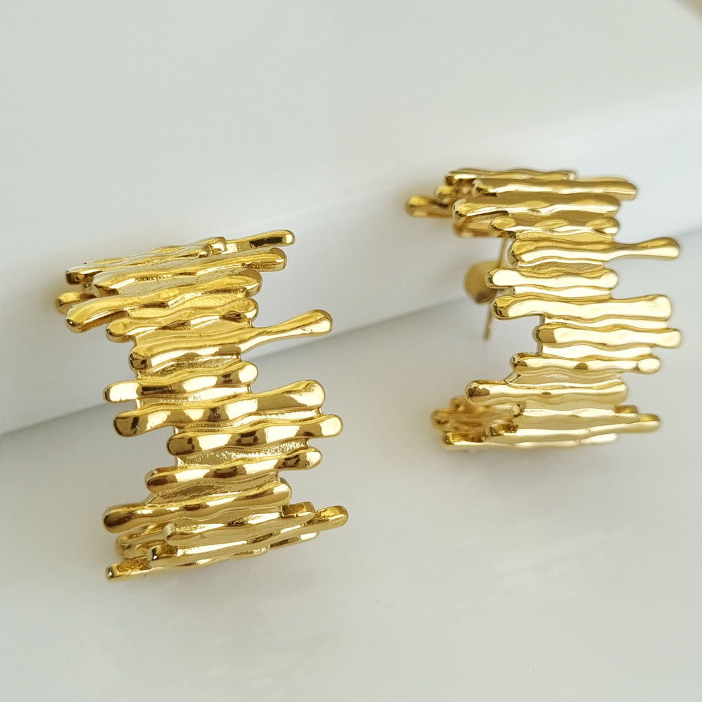 18K gold-plated textured studs, waterproof gold earrings, anti-tarnish statement studs, hypoallergenic luxury jewelry, sculptural gold earrings, organic layered studs.