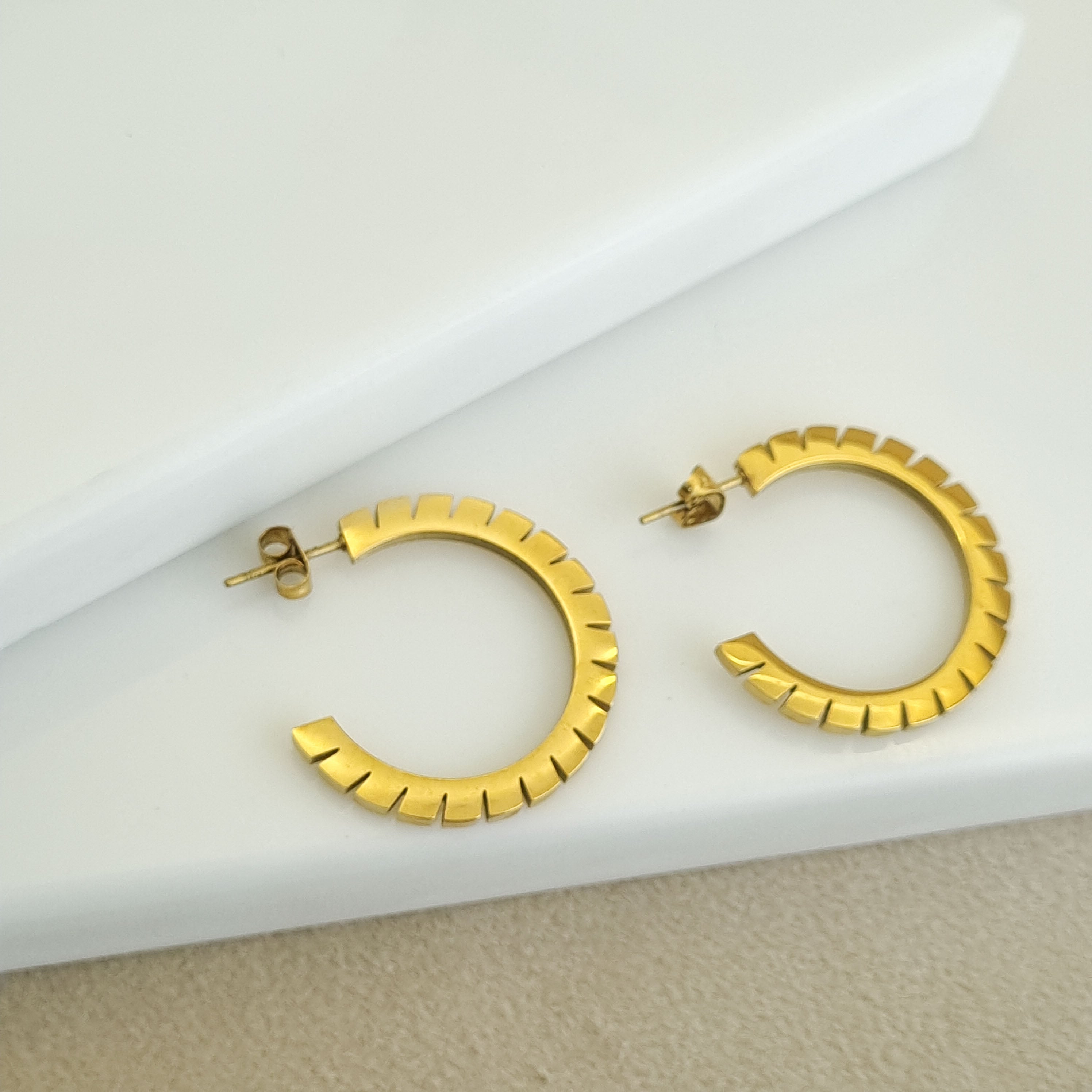 18K gold-plated notched hoops, waterproof gold earrings, anti-tarnish architectural hoops, hypoallergenic luxury jewelry, sculptural gold earrings, industrial beam hoop earrings.
