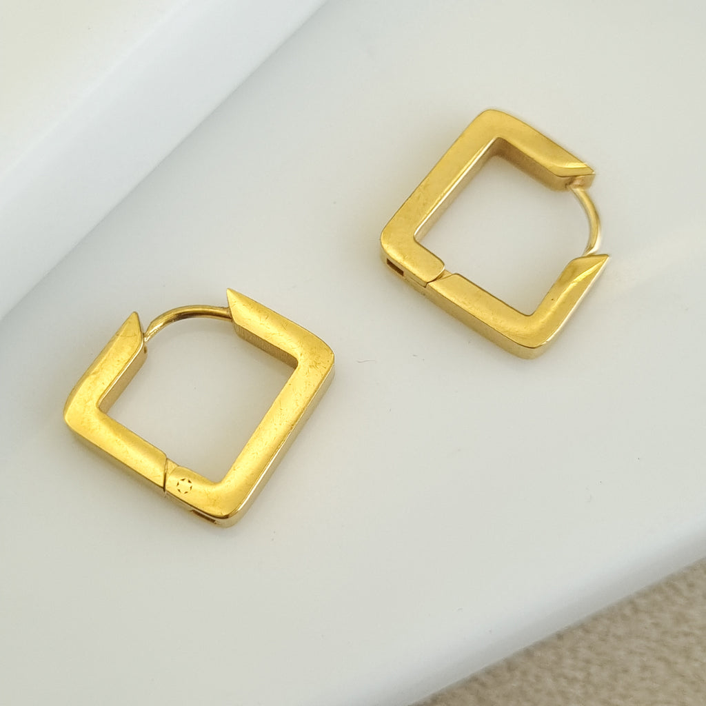 18K gold-plated square hoops, waterproof gold earrings, anti-tarnish geometric huggies, hypoallergenic luxury jewelry, sculptural gold earrings, rectangular hoop earrings.