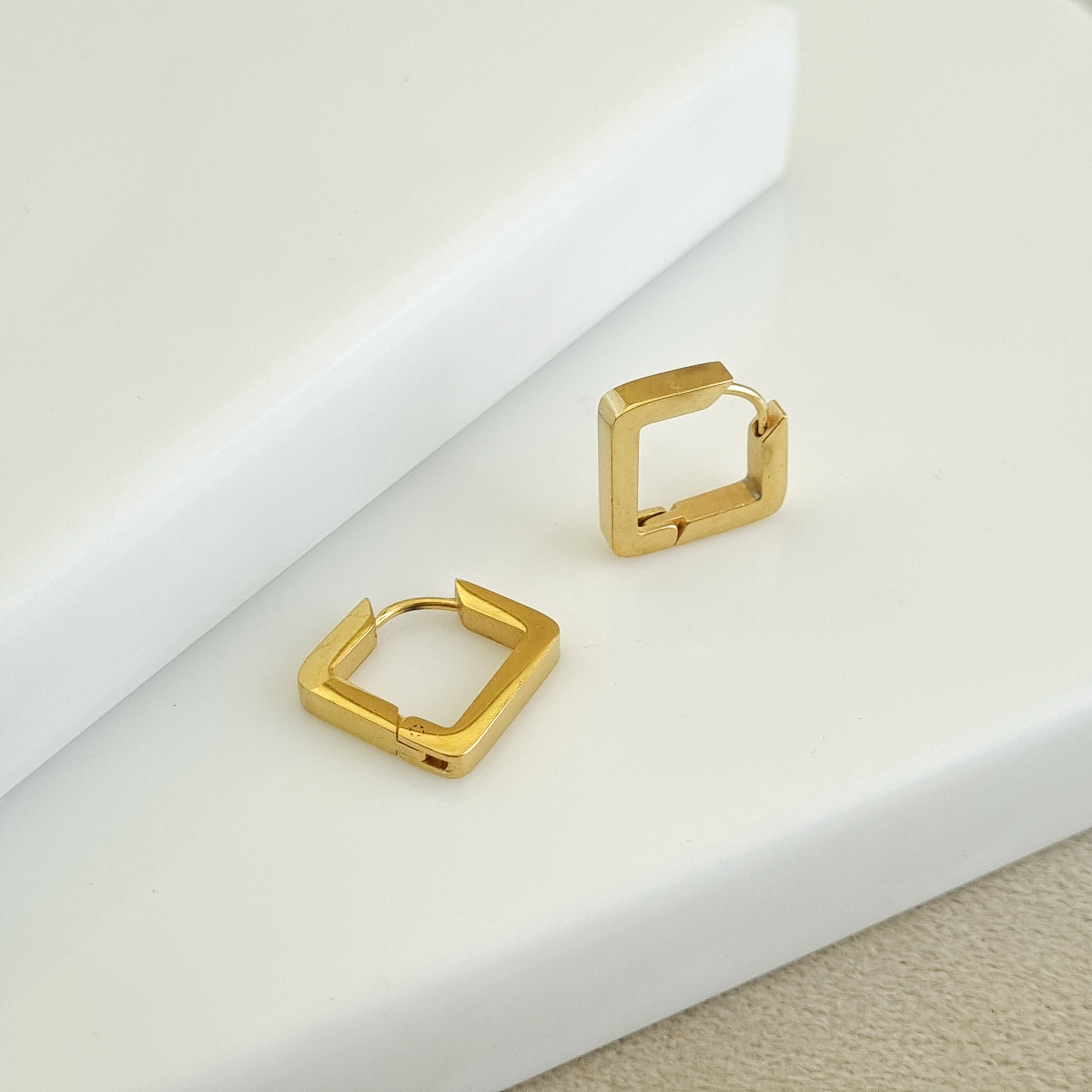 Quadra Architectural Huggie Earrings