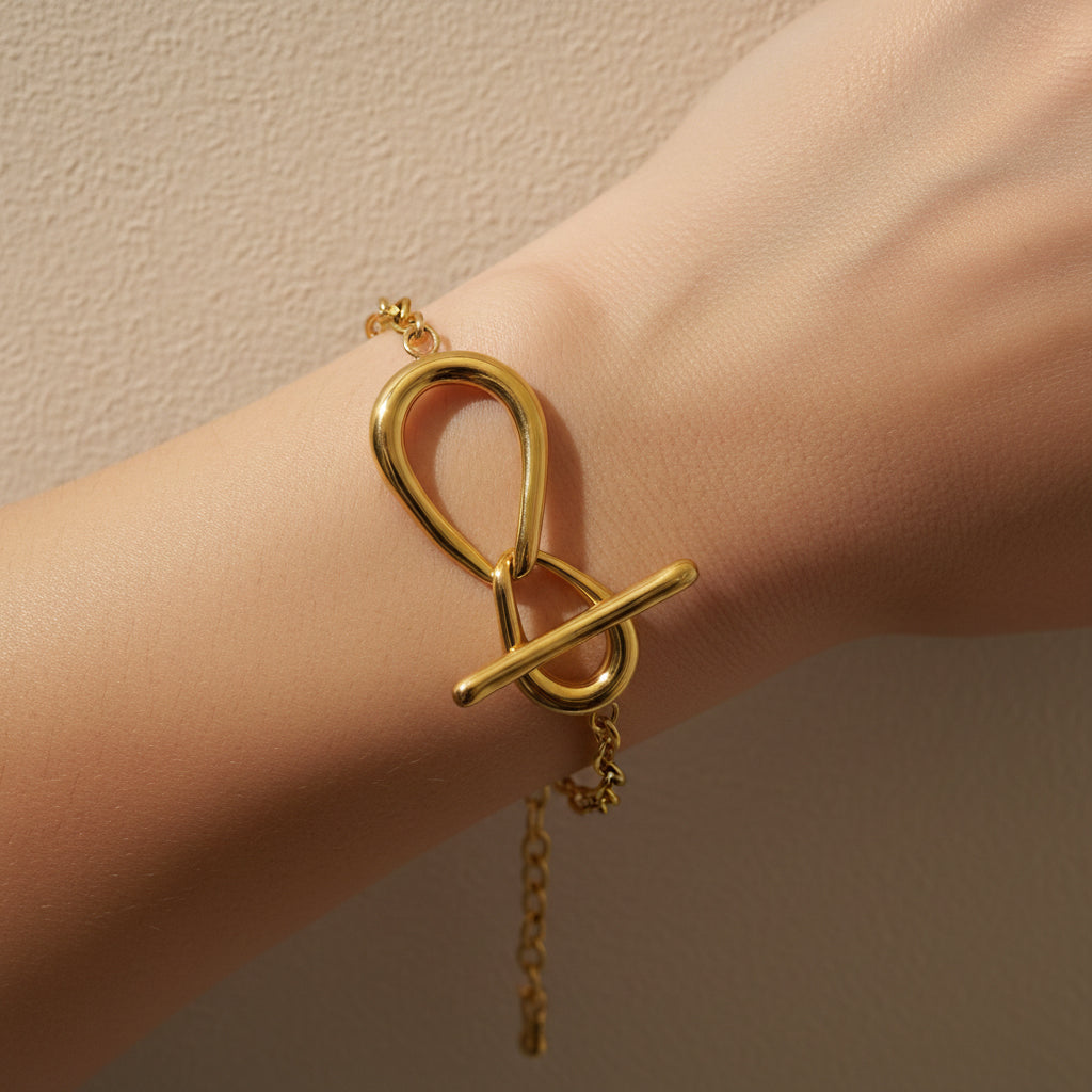 Infinity toggle bracelet, anti-tarnish gold bracelet, 18K gold plated statement jewelry, waterproof link bracelet, tarnish-resistant gold jewelry.
