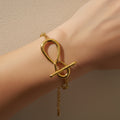 Infinity toggle bracelet, anti-tarnish gold bracelet, 18K gold plated statement jewelry, waterproof link bracelet, tarnish-resistant gold jewelry.