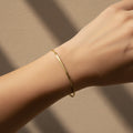 Slim gold snake chain bracelet, 18K gold plated herringbone jewelry, waterproof minimalist bracelet, anti-tarnish gold jewelry, Treshire Siena collection.
