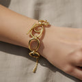 Bold gold toggle bracelet, 18K gold plated structural jewelry, waterproof oversized link bracelet, anti-tarnish sculptural jewelry, Treshire bold collection.
