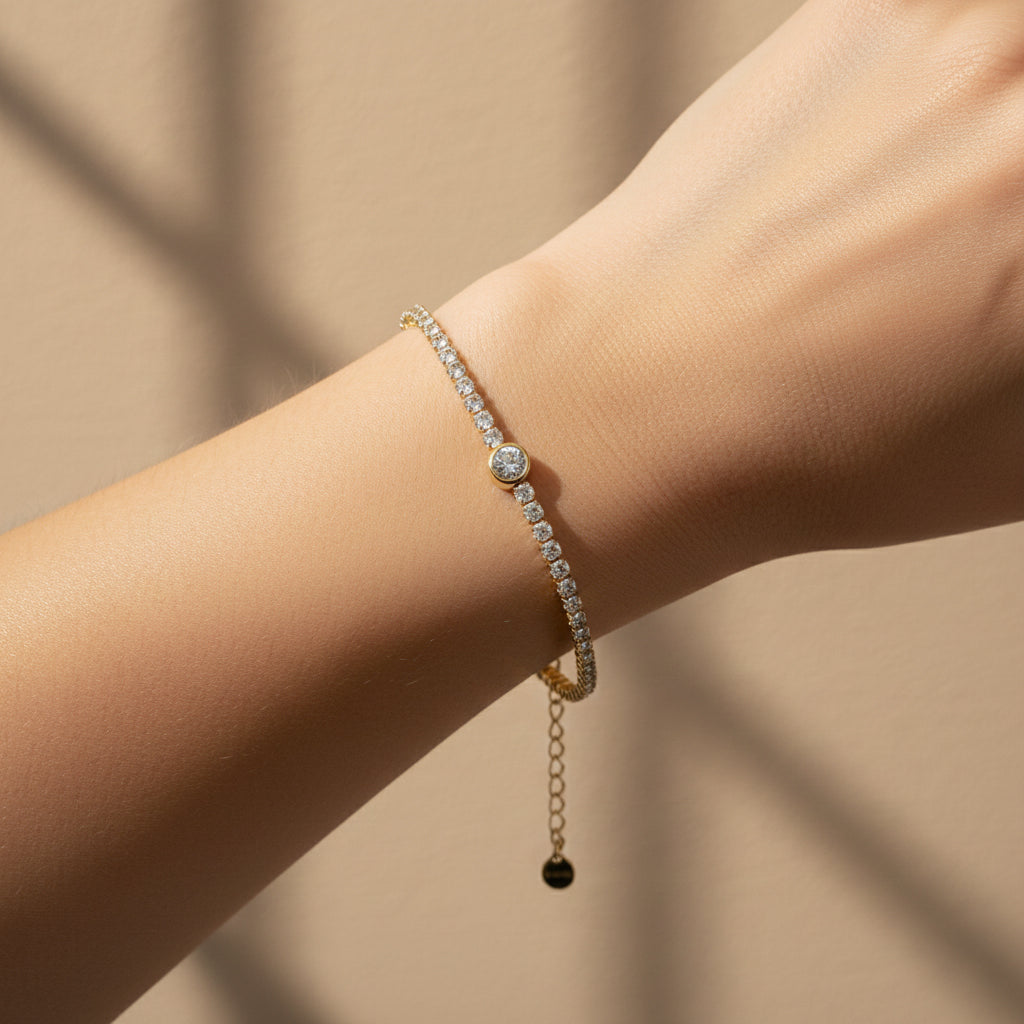 Gold tennis bracelet, 18K gold plated crystal jewelry, waterproof solitaire bracelet, anti-tarnish bezel-set jewelry, Treshire Stellar collection.