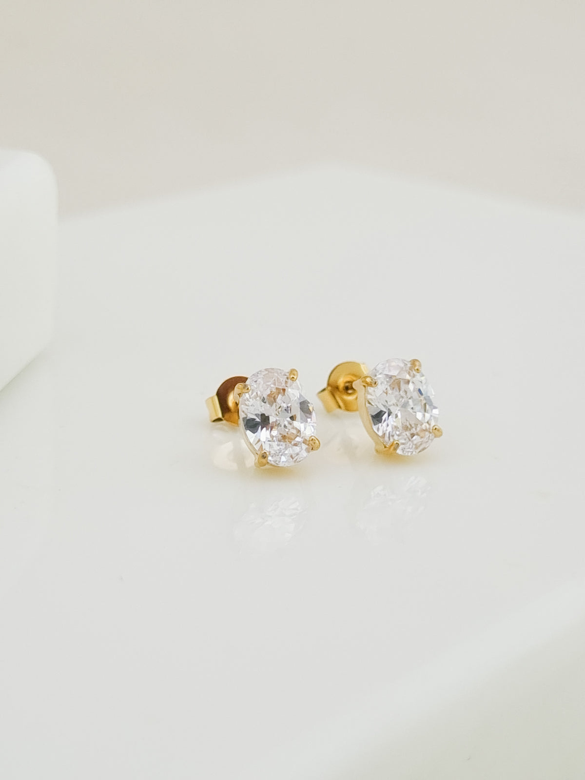 Oval CZ Four-Prong Solitaire Stud Earrings