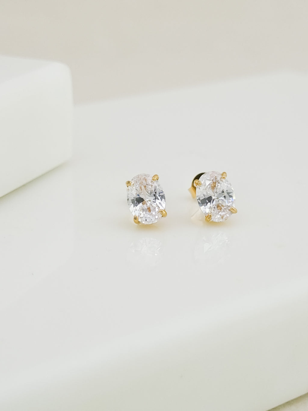 Oval CZ Four-Prong Solitaire Stud Earrings