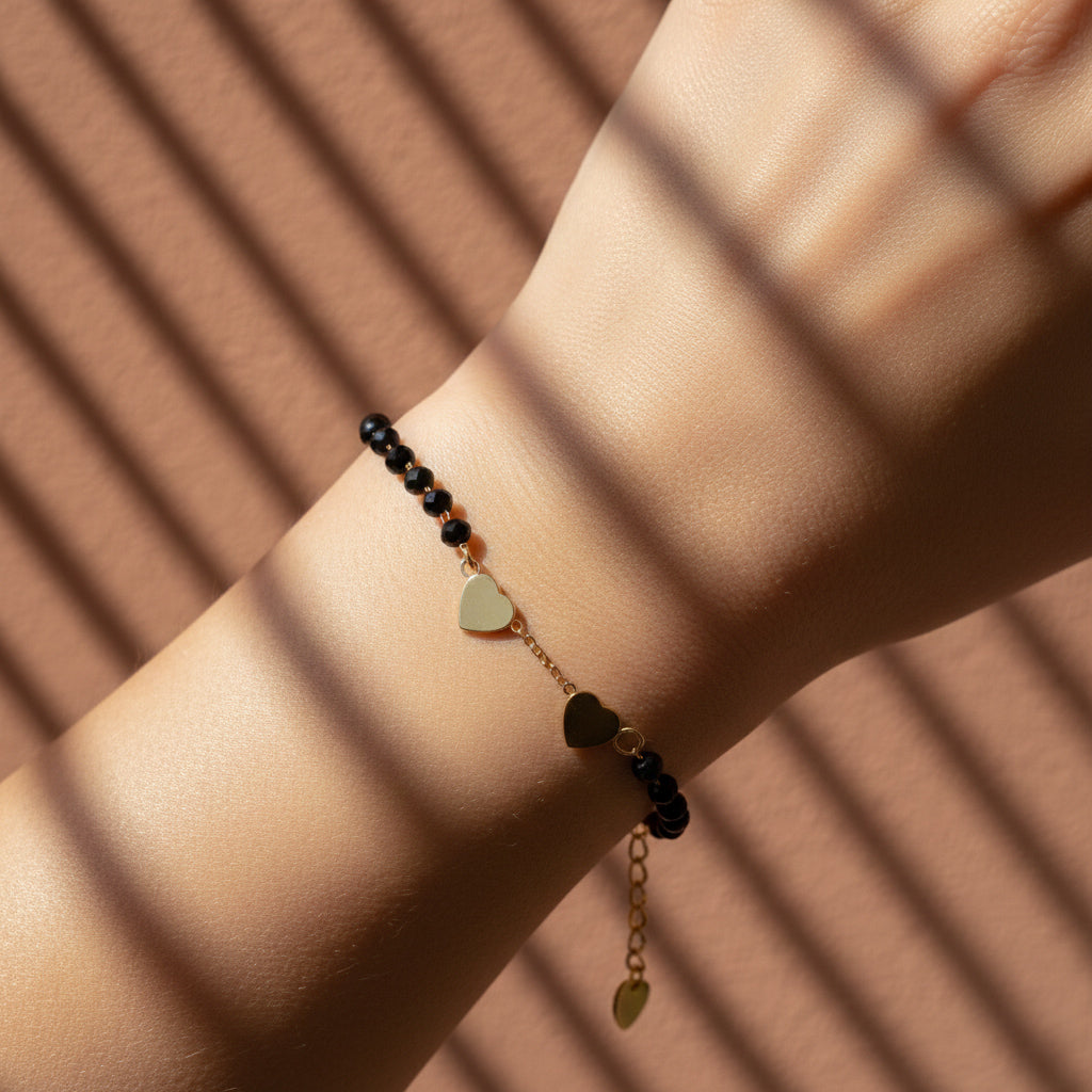 Heart mangalsutra bracelet, 18K gold plated hand mangalsutra, waterproof black bead jewelry, anti-tarnish heart charm bracelet, Treshire Amara collection.
