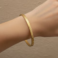 Waterproof gold bangle, anti-tarnish geometric cuff, 18K gold plated prism bracelet, Treshire Prism collection.