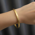 Waterproof gold bangle, anti-tarnish minimalist cuff, 18K gold plated linear bracelet, Treshire Horizon collection.