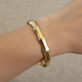 Waterproof bamboo bangle, gold bamboo jewelry with blue enamel, 18K gold plated structural cuff, anti-tarnish tropical jewelry, Treshire Bamboo Breeze collection.