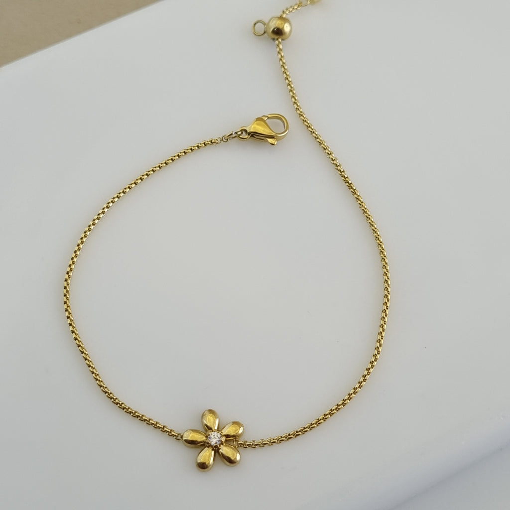 Gold flower jewelry for women, minimalist crystal bracelet, durable gold plated accessories, hypoallergenic gold bracelet, dainty gold gift.