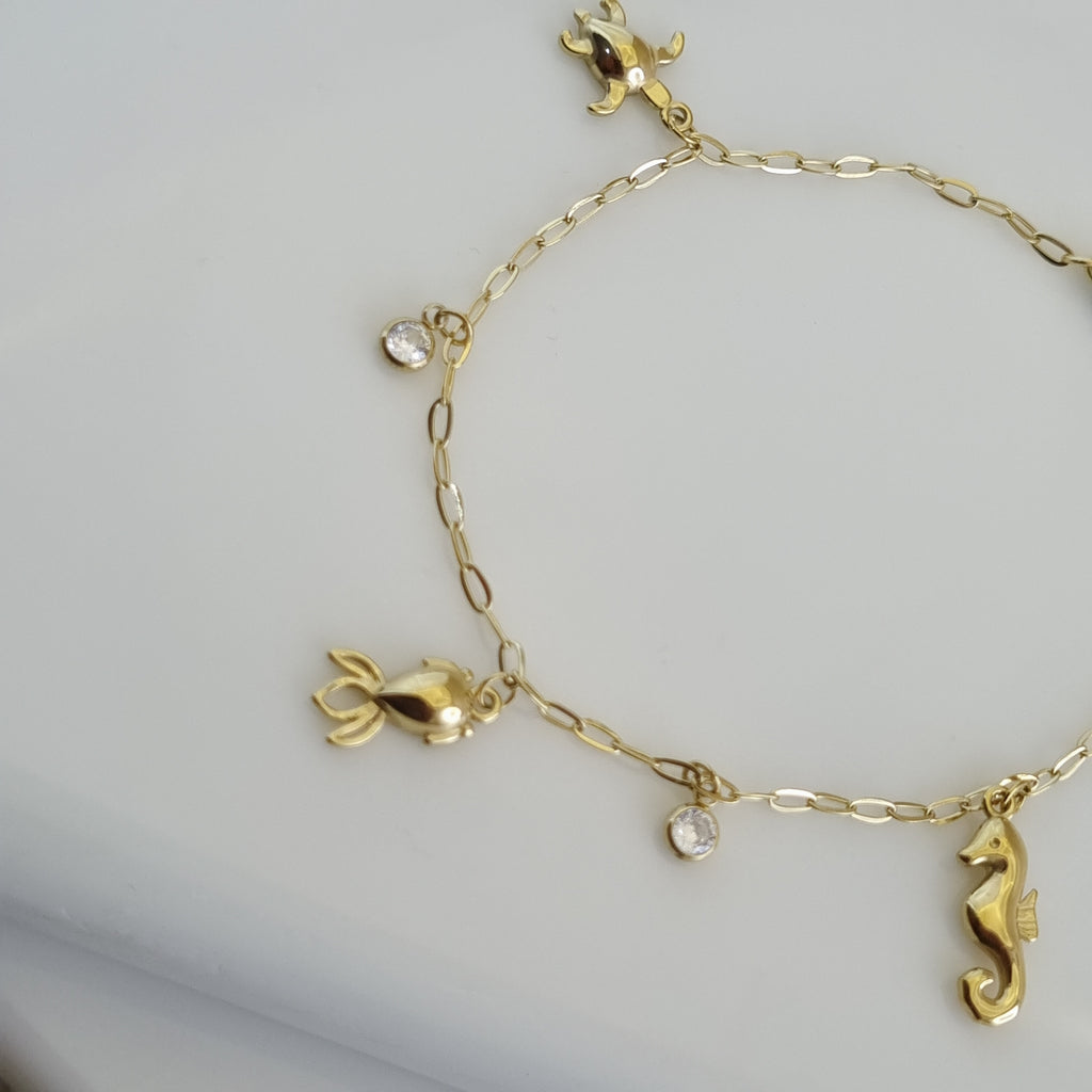 Sea life charm bracelet, 18K gold plated turtle jewelry, waterproof seahorse bracelet, anti-tarnish ocean jewelry, Treshire Ocean Collection.