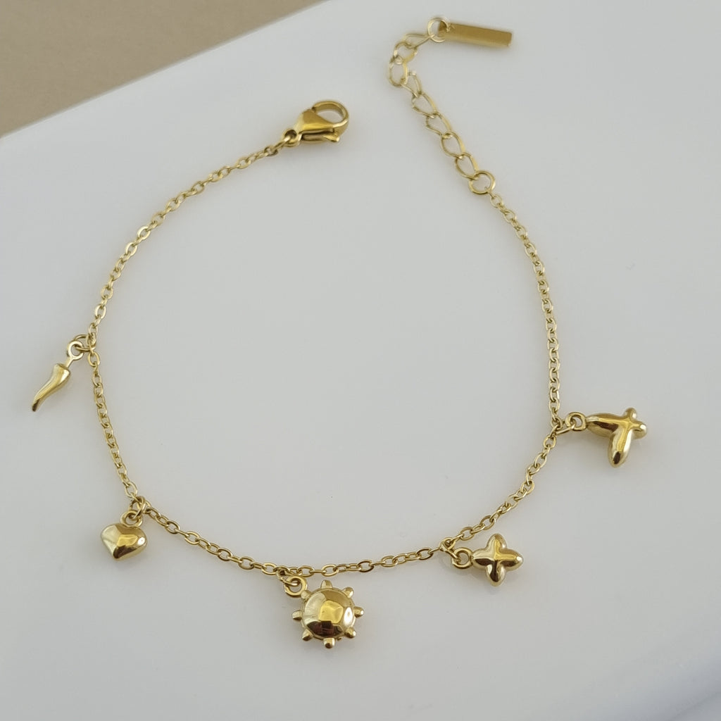 Whimsical Charm Bracelet, 18K gold plated charm jewelry, waterproof sun and heart bracelet, anti-tarnish gold charms, Treshire Celestial jewelry.