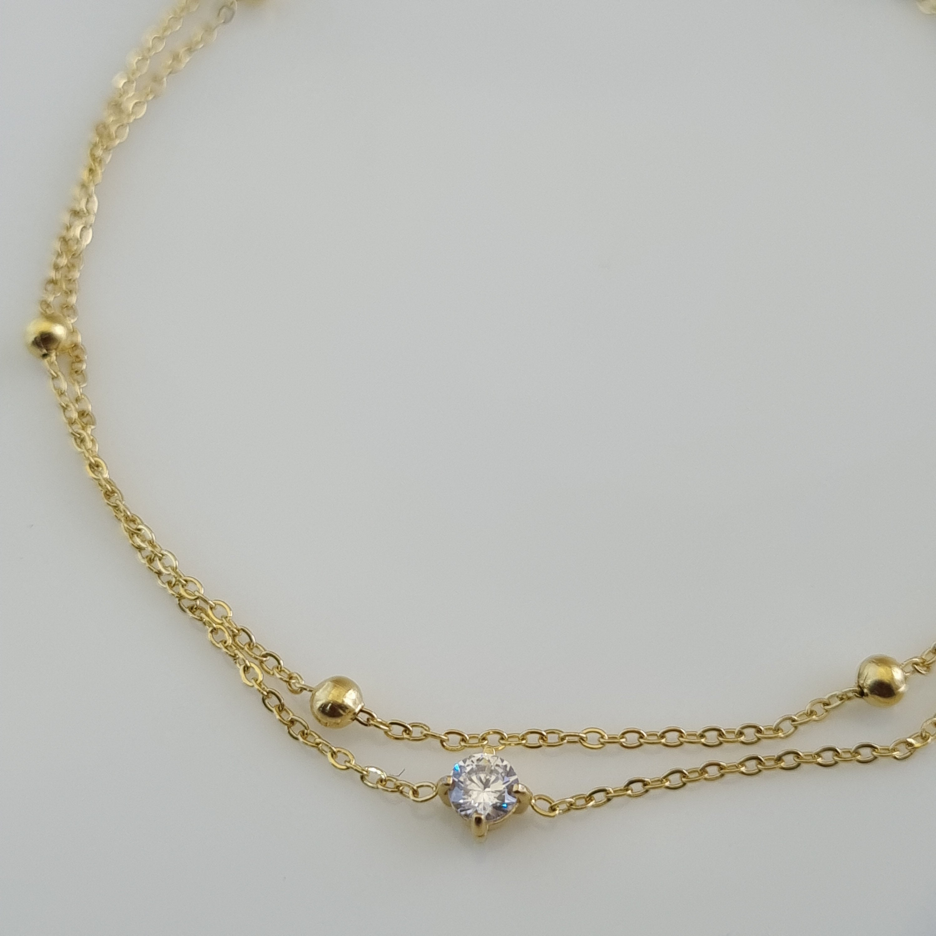 Layered gold anklet, anti-tarnish crystal anklet, waterproof 18K gold jewelry, double chain foot jewelry, tarnish-resistant gold anklet.