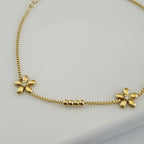 Floral ankle bracelet, crystal anklet for women, tarnish-resistant gold anklet, gold bead anklet, beach-ready jewelry.