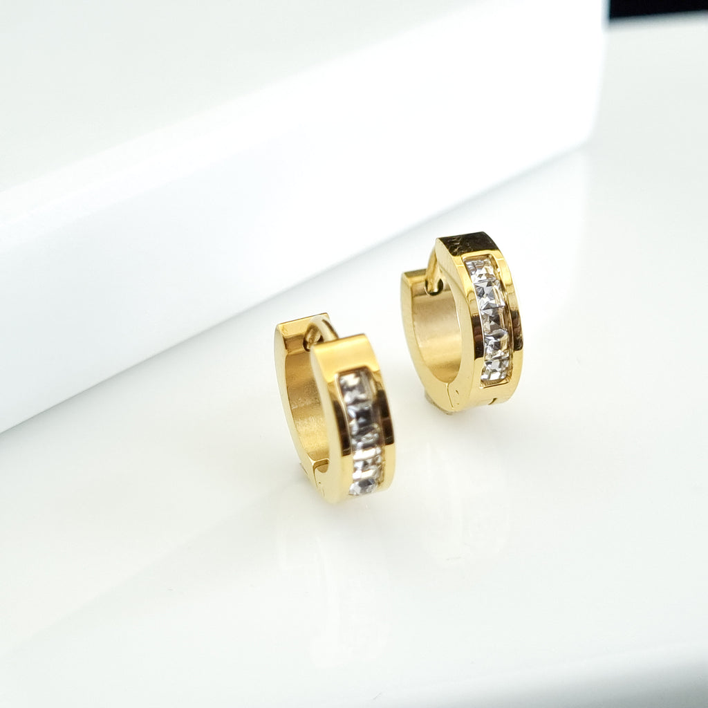 18K gold-plated crystal hoops, waterproof gold earrings, anti-tarnish channel huggies, hypoallergenic luxury jewelry, sculptural gold hoops, rectangular crystal earrings.