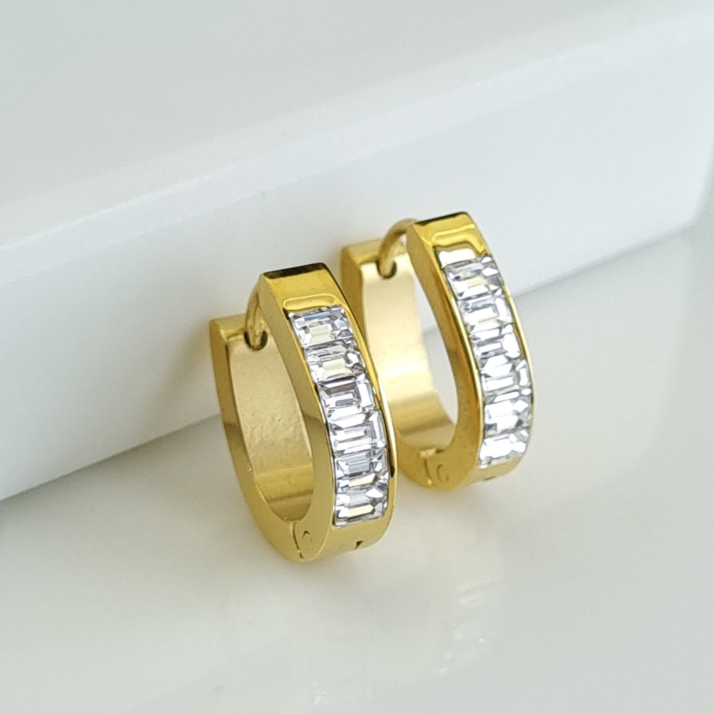 18K gold-plated baguette hoops, waterproof crystal earrings, anti-tarnish huggie earrings, hypoallergenic luxury jewelry, sculptural gold hoops, rectangular crystal earrings.