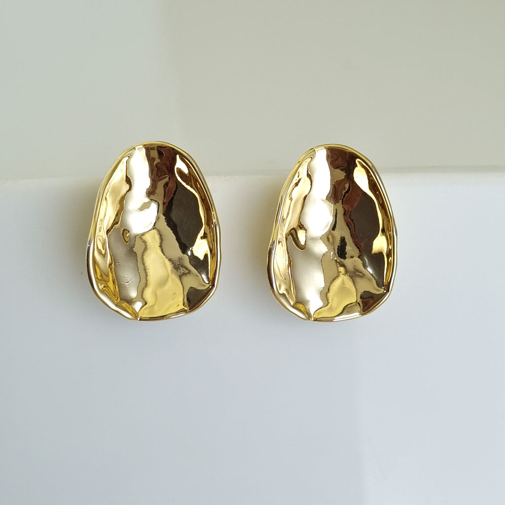 18K gold-plated hammered earrings, waterproof gold studs, anti-tarnish statement earrings, hypoallergenic organic jewelry, sculptural gold studs, textured gold jewelry.