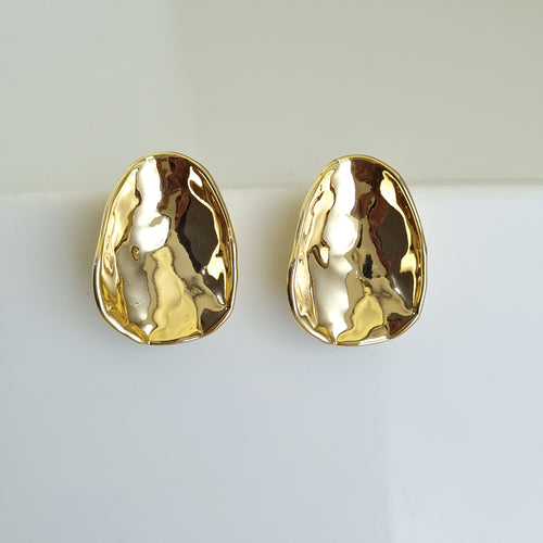 18K gold-plated hammered earrings, waterproof gold studs, anti-tarnish statement earrings, hypoallergenic organic jewelry, sculptural gold studs, textured gold jewelry.