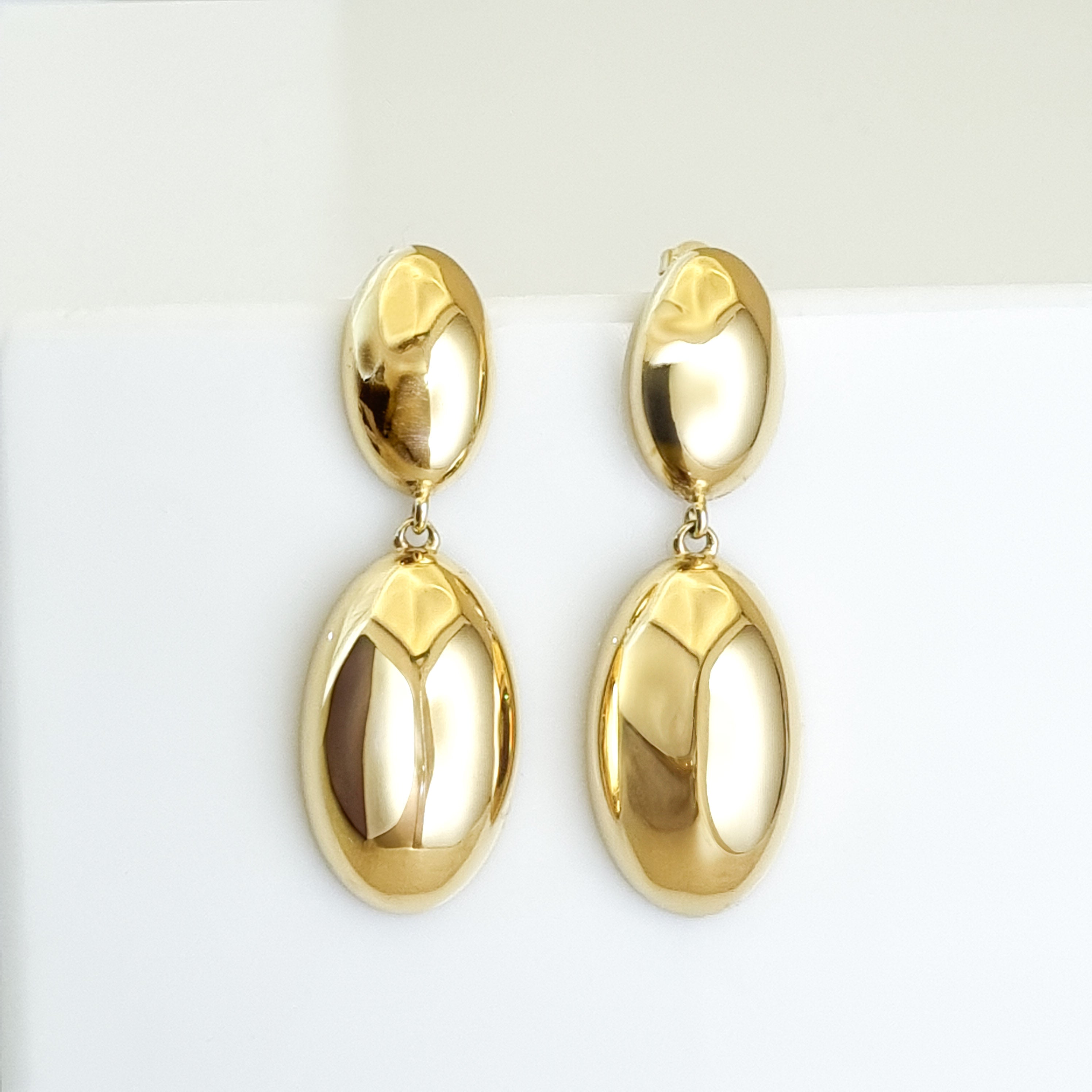 18K gold-plated drop earrings, waterproof gold earrings, anti-tarnish statement earrings, hypoallergenic luxury jewelry, sculptural gold drops, architectural gold earrings.