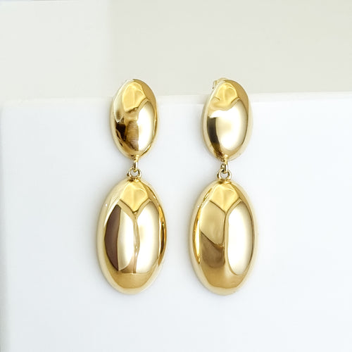 18K gold-plated drop earrings, waterproof gold earrings, anti-tarnish statement earrings, hypoallergenic luxury jewelry, sculptural gold drops, architectural gold earrings.