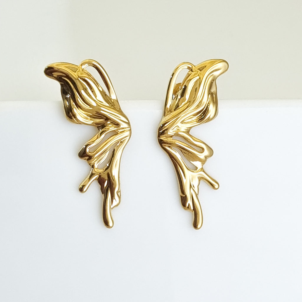 18K gold-plated sculptural earrings, waterproof gold ear climbers, anti-tarnish flame earrings, hypoallergenic avant-garde jewelry, organic gold studs, architectural gold earrings.