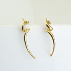 18K gold-plated sculptural earrings, waterproof gold ear climbers, anti-tarnish flame earrings, hypoallergenic avant-garde jewelry, Molten Abstract Flare jewelry, architectural gold earrings.