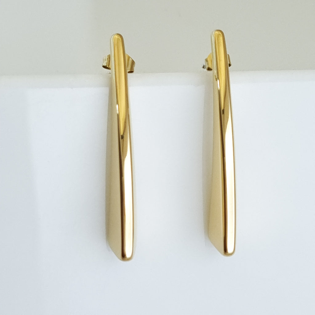 18K gold-plated drop earrings, waterproof gold earrings, anti-tarnish statement earrings, hypoallergenic luxury jewelry, sculptural gold prism, architectural gold earrings.