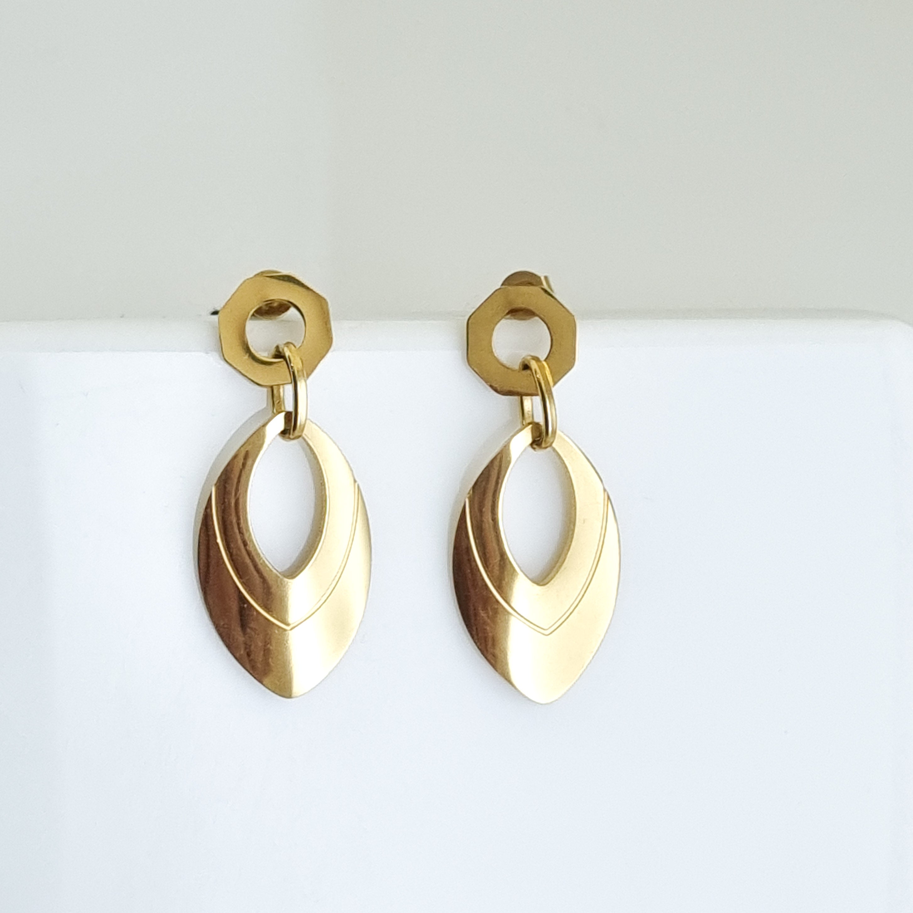 18K gold-plated drop earrings, waterproof gold dangles, anti-tarnish statement earrings, hypoallergenic luxury jewelry, sculptural marquise earrings, geometric gold drop earrings.