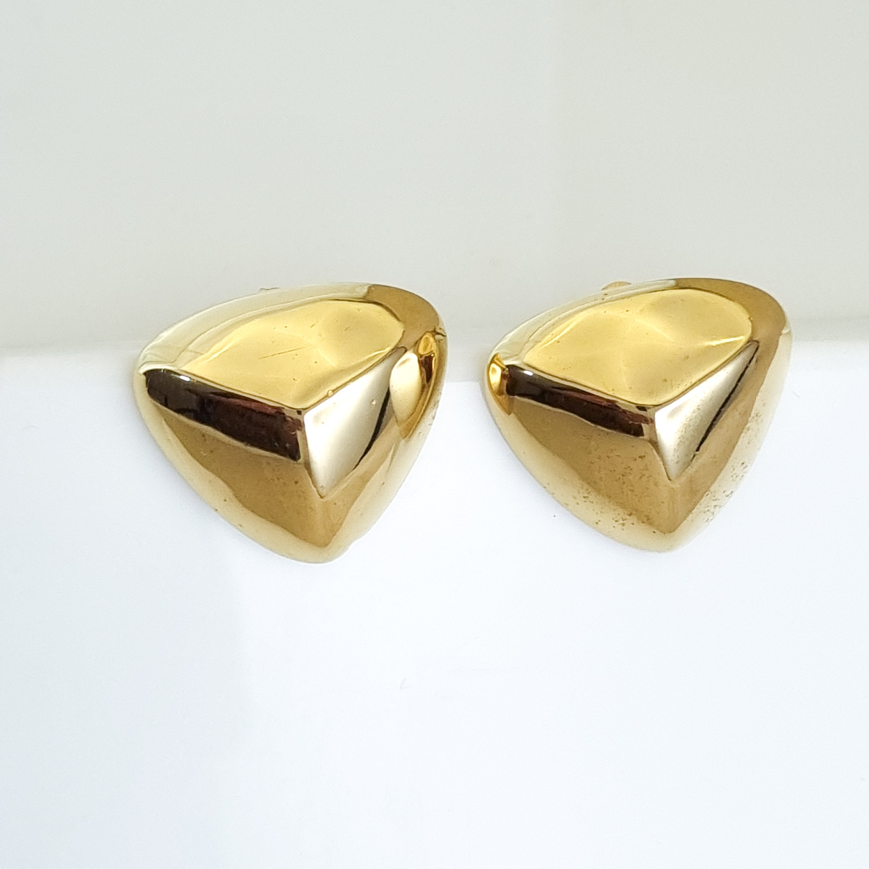 18K gold-plated prism studs, waterproof gold earrings, anti-tarnish geometric studs, hypoallergenic luxury jewelry, sculptural gold studs, triangular pyramid earrings.