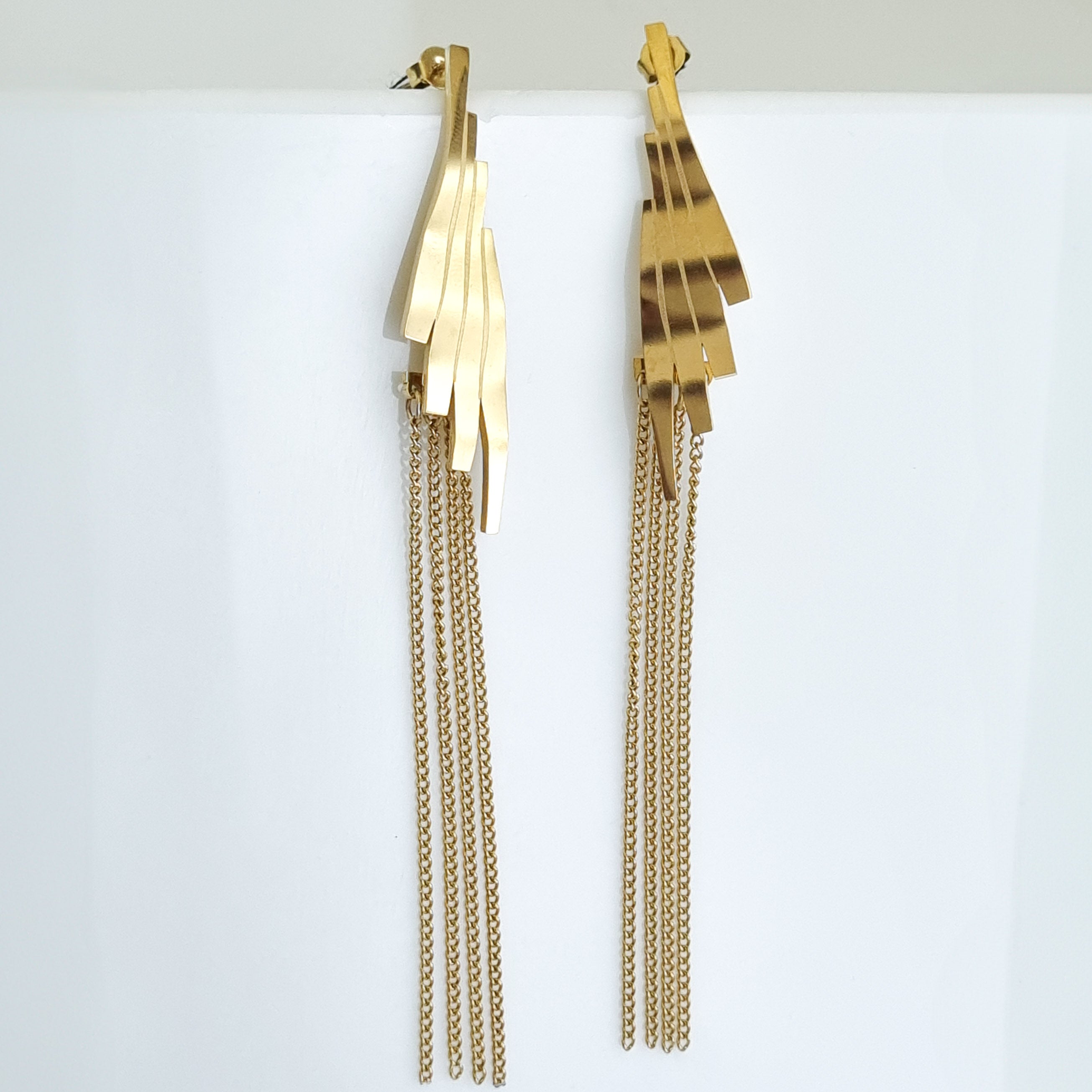 18K gold-plated fringe earrings, waterproof gold dangles, anti-tarnish linear hoops, hypoallergenic luxury jewelry, sculptural gold earrings, cascading chain drop earrings.