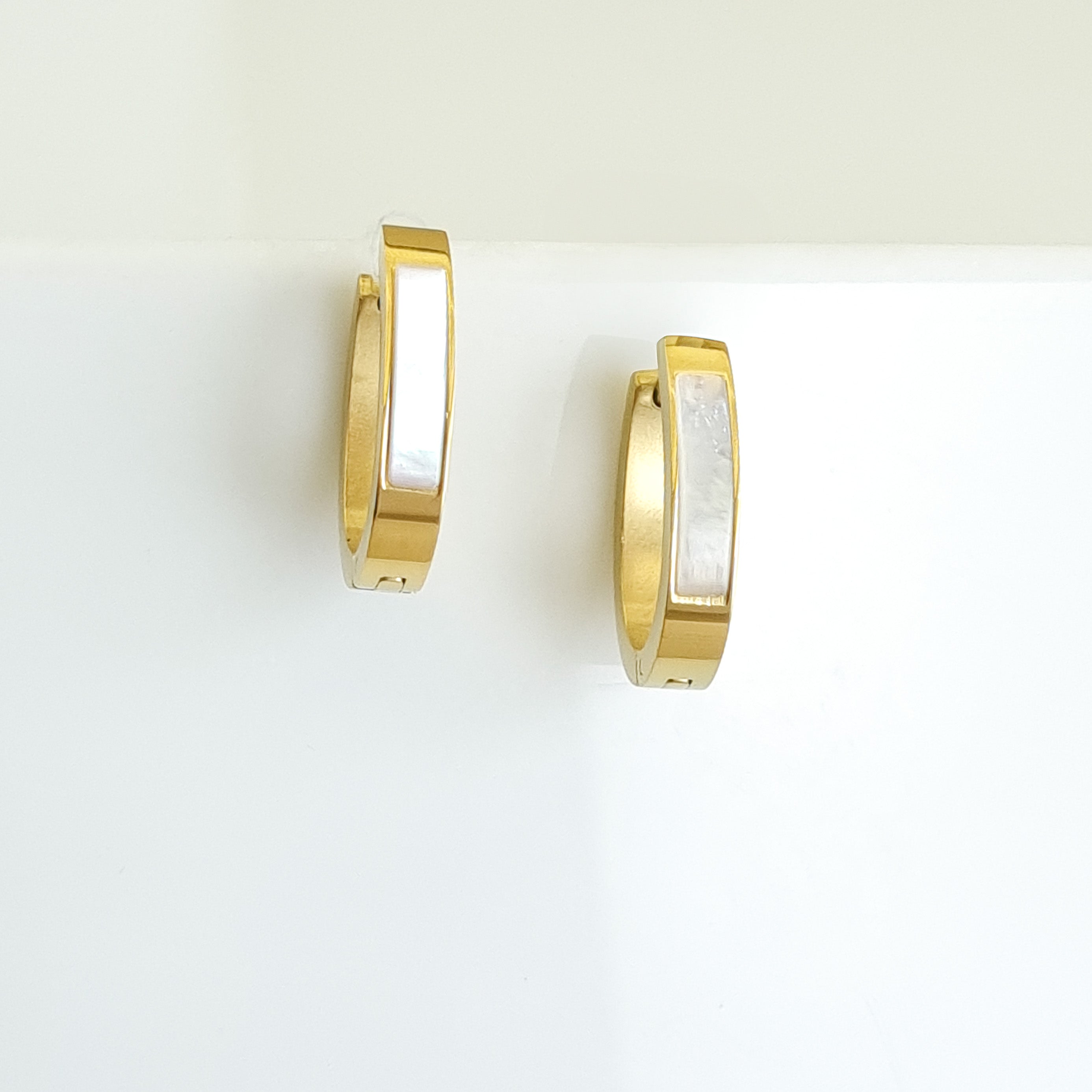18K gold-plated huggie hoops, waterproof gold earrings, anti-tarnish inlay earrings, hypoallergenic luxury jewelry, sculptural gold hoops, rectangular huggie earrings.