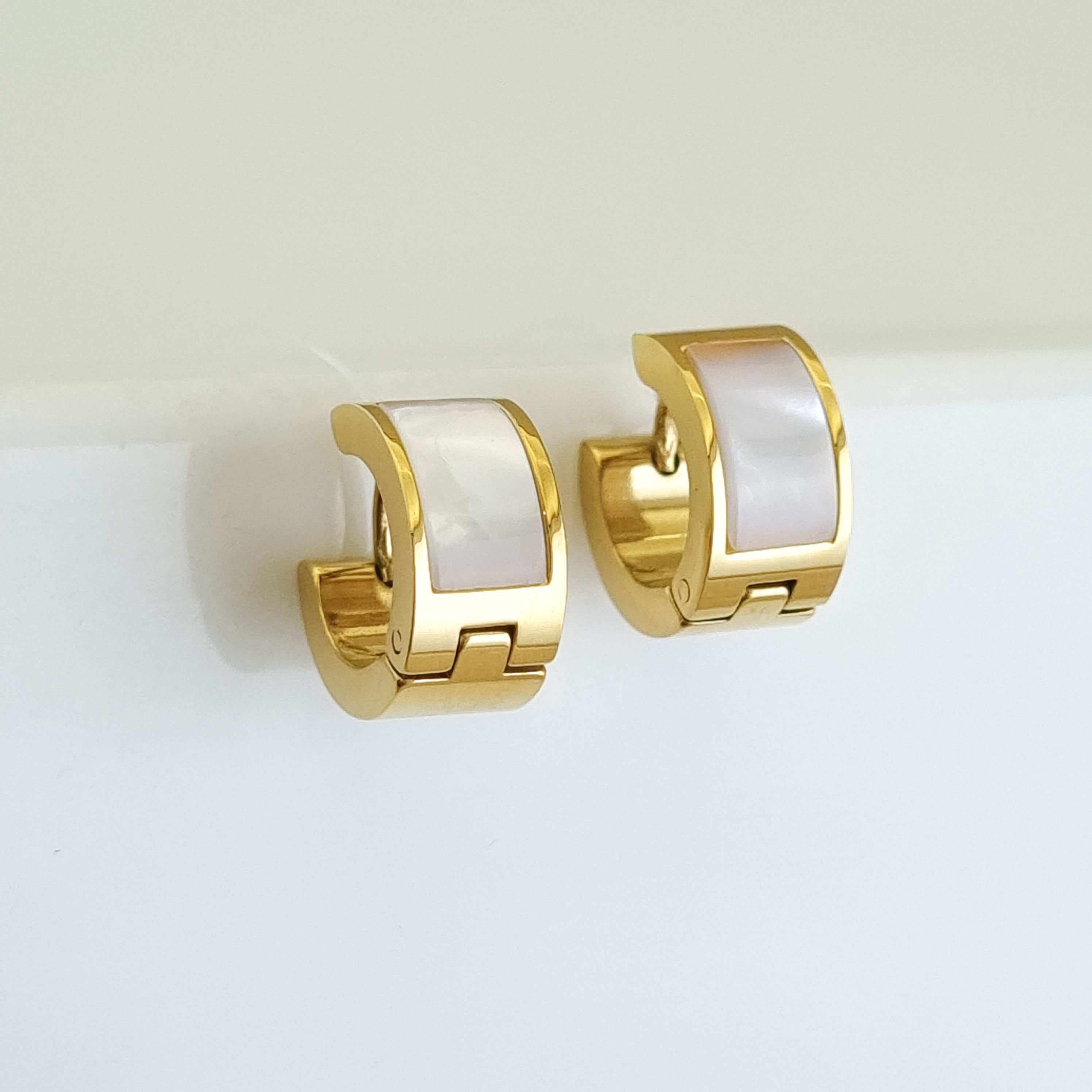 18K gold-plated micro huggies, waterproof gold earrings, anti-tarnish inlay hoops, hypoallergenic luxury jewelry, small geometric hoops, rectangular gold huggies.