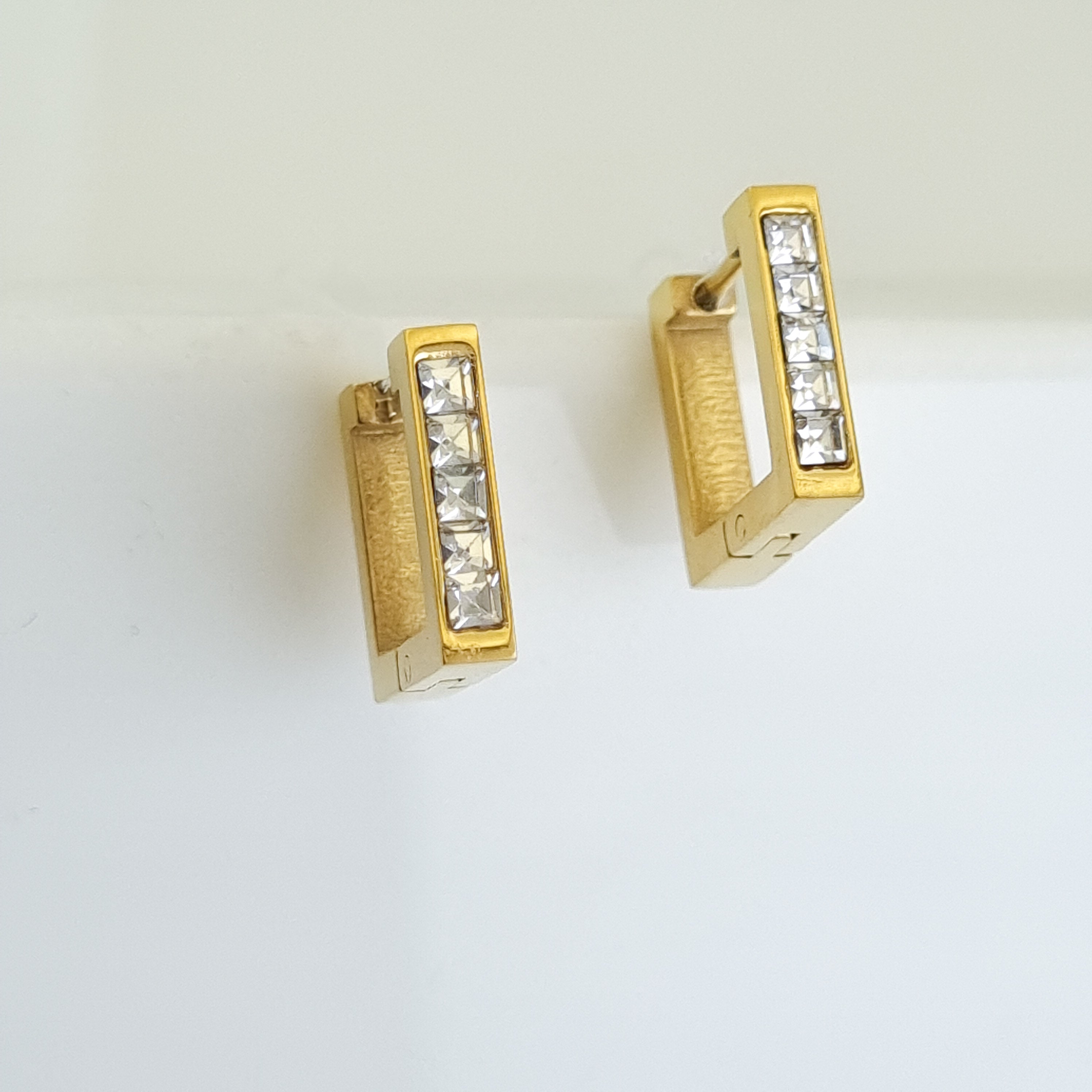 18K gold-plated baguette studs, waterproof crystal earrings, anti-tarnish bar studs, hypoallergenic luxury jewelry, sculptural gold studs, vertical geometric earrings.