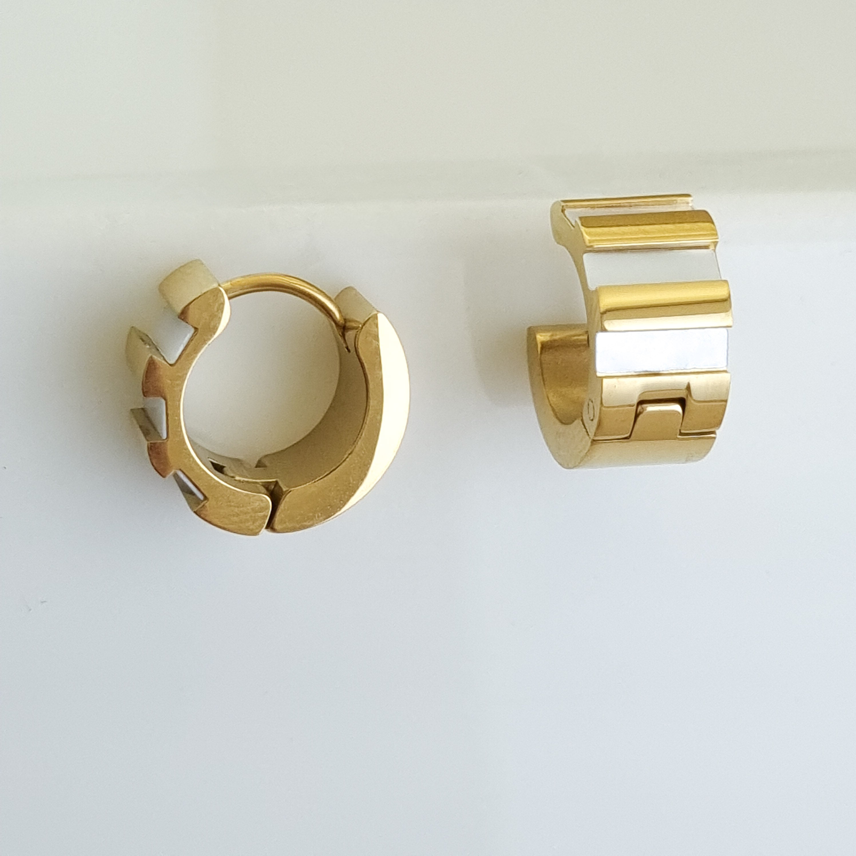 18K gold-plated ribbon hoops, waterproof inlay earrings, anti-tarnish architectural huggies, hypoallergenic luxury jewelry, sculptural gold hoops, tiered inlay earrings.