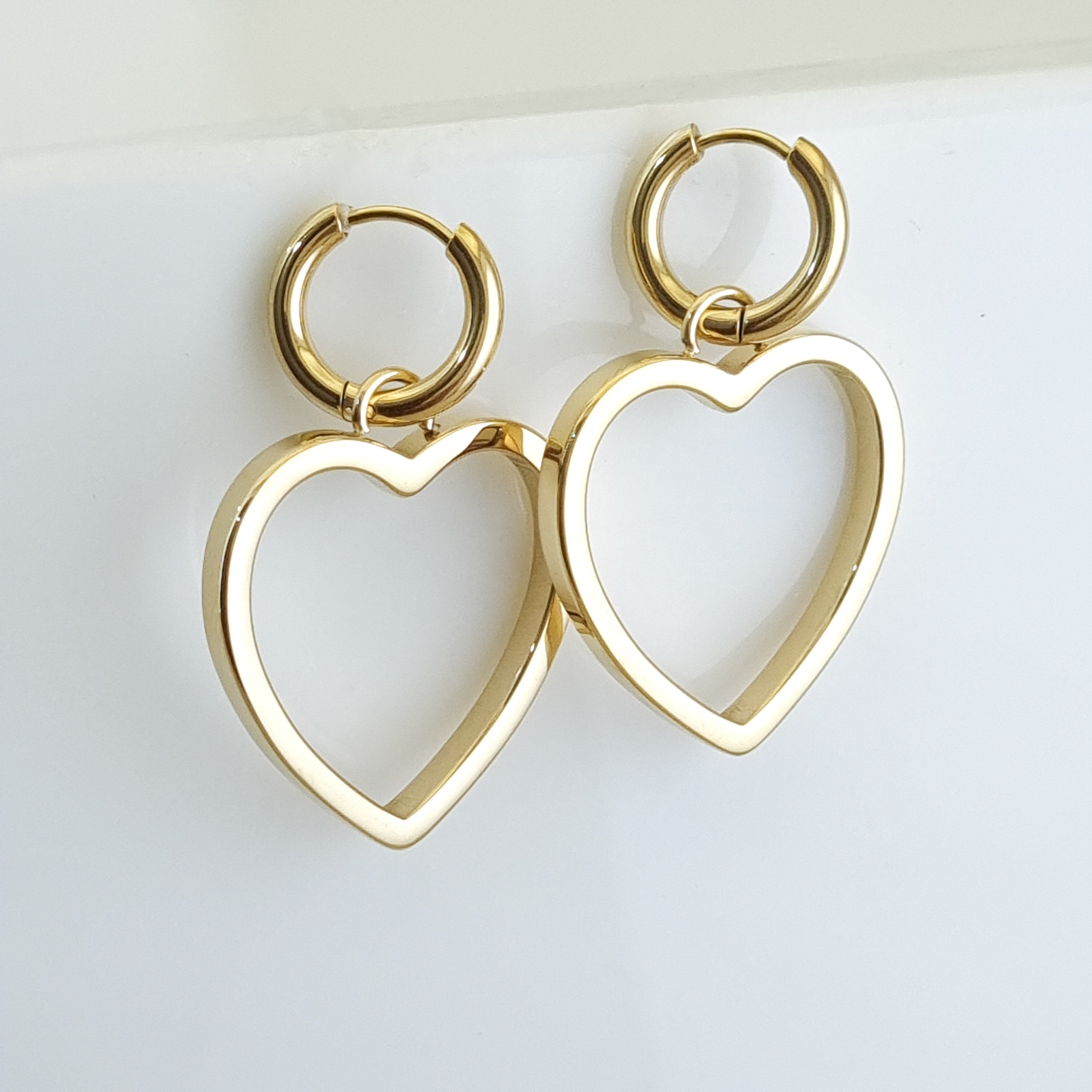 18K gold-plated heart earrings, waterproof gold drops, anti-tarnish heart jewelry, hypoallergenic luxury earrings, sculptural gold drops, open heart hoop earrings.