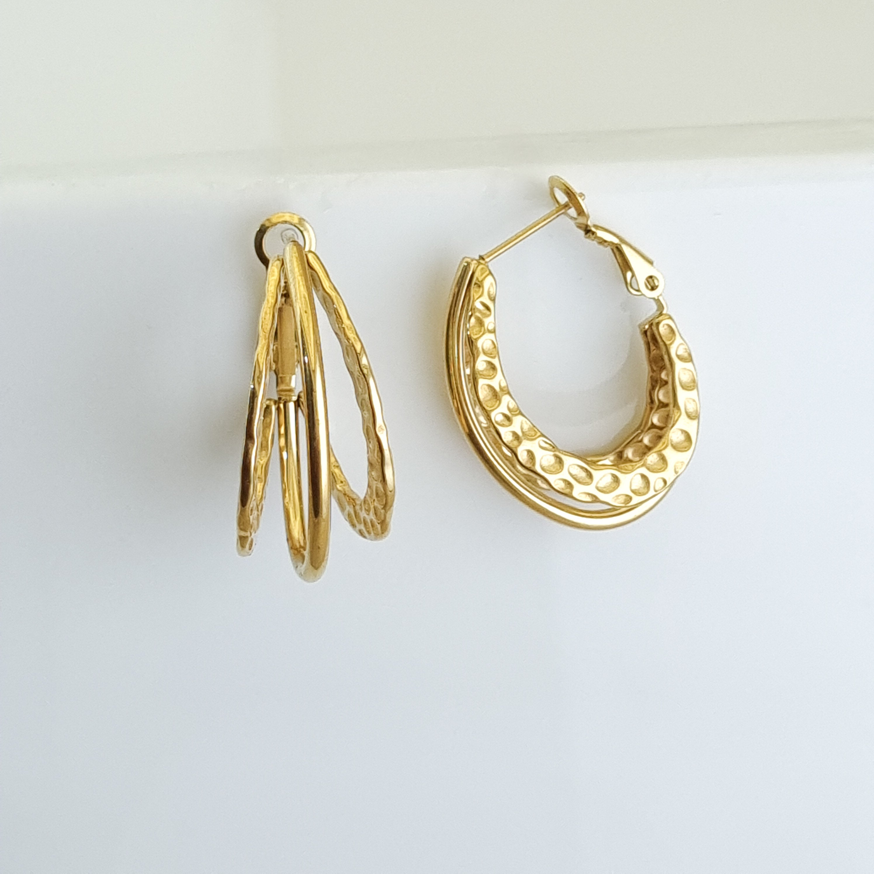 18K gold-plated triple hoops, waterproof gold earrings, anti-tarnish statement hoops, hypoallergenic luxury jewelry, sculptural hammered earrings, multi-band gold hoops.